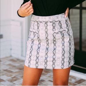 L. Love snake skin skirt.